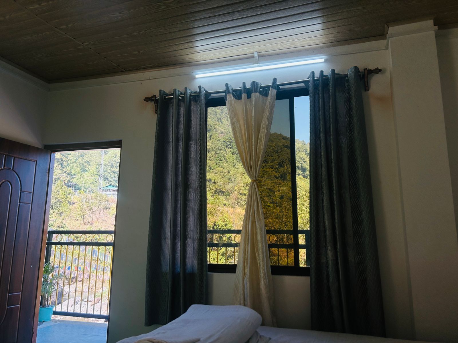 Attached bathroom with modern sink and mirror